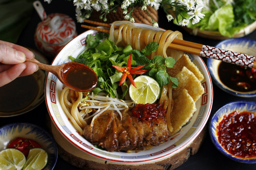 Cao Lau is often considered the most iconic Hoi An food dish.